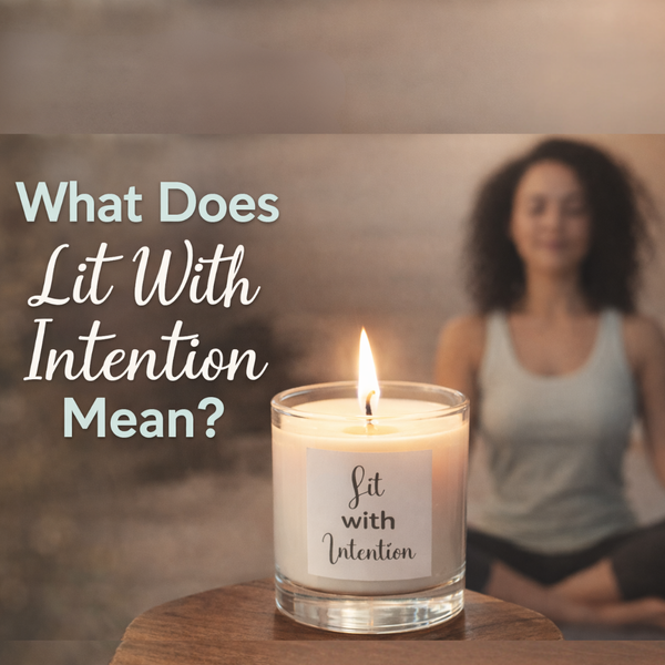 Lit candle labeled “Lit with Intention” in the foreground with a blurred woman meditating in the background and the text “What Does Lit With Intention Mean?”