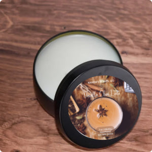 Matte black tin candle with warm spice and vanilla notes