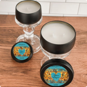 Autumn Whispers candle tin with green, mint, and musk scent