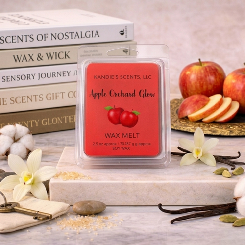 Kandie's Scents Apple Orchard Glow wax melt with apples and books in the background