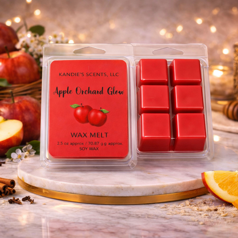 Kandie's Scents Apple Orchard Glow wax melts packaging with red wax melts on a decorative surface.