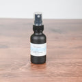 Coastal Breeze room spray bottle with sea air and floral scent