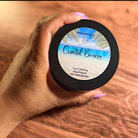 Matte black tin candle with driftwood, jasmine, and musk blend