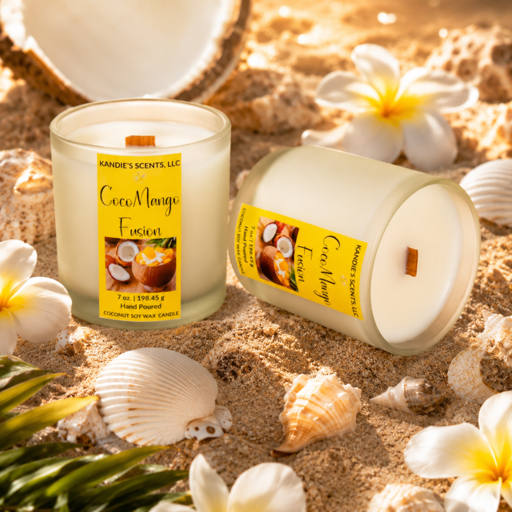 Two candles labeled 'CocoMango Fusion' on a sandy background with flowers and shells.