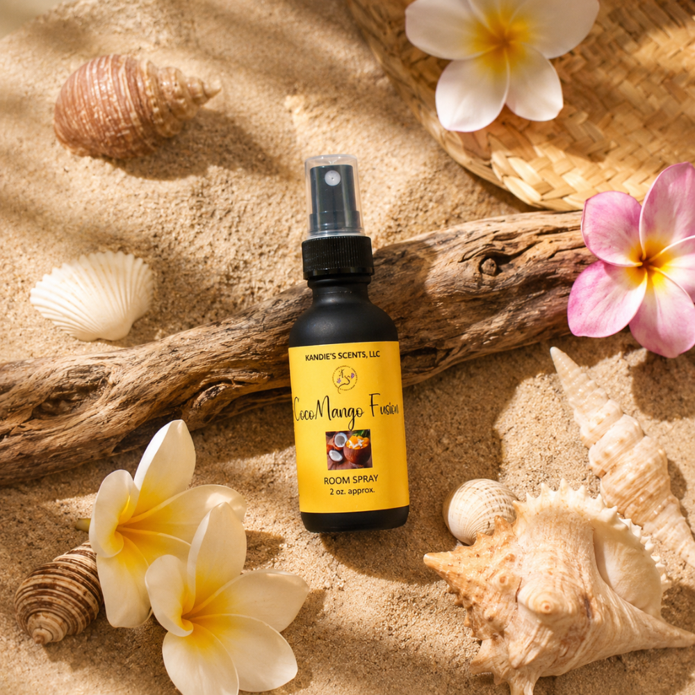 Room spray bottle with a yellow label on sand with flowers and shells