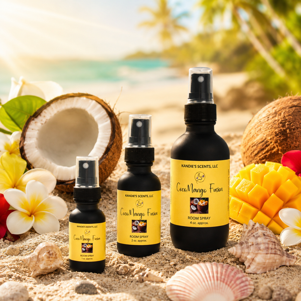 Three bottles of Kandie's Scents room spray on a beach setting with coconuts, mangoes, and flowers.