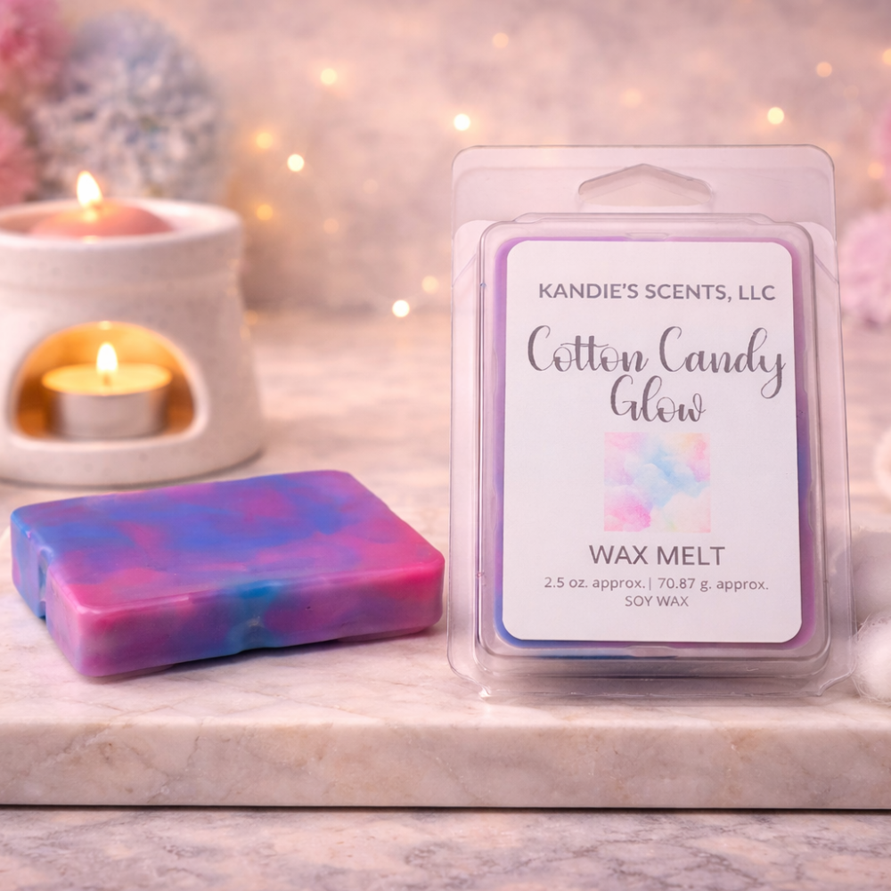 Wax melt package labeled 'Cotton Candy Glow' by Kandie's Scents, LLC with a colorful wax bar on a blurred candlelit background.