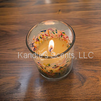 Fun celebration soy wax candle in glass jar with bamboo lid