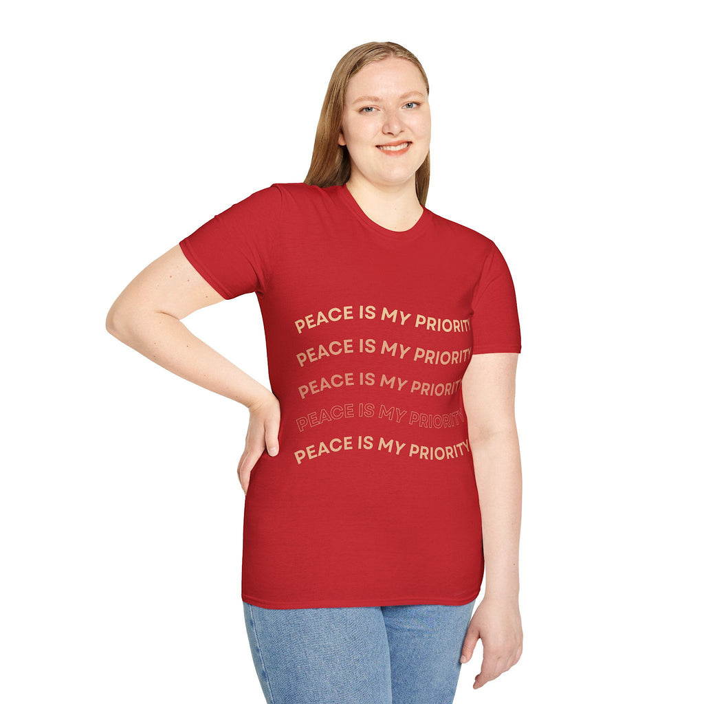 Person wearing a red t-shirt with 'Peace is my priority' text on a white background