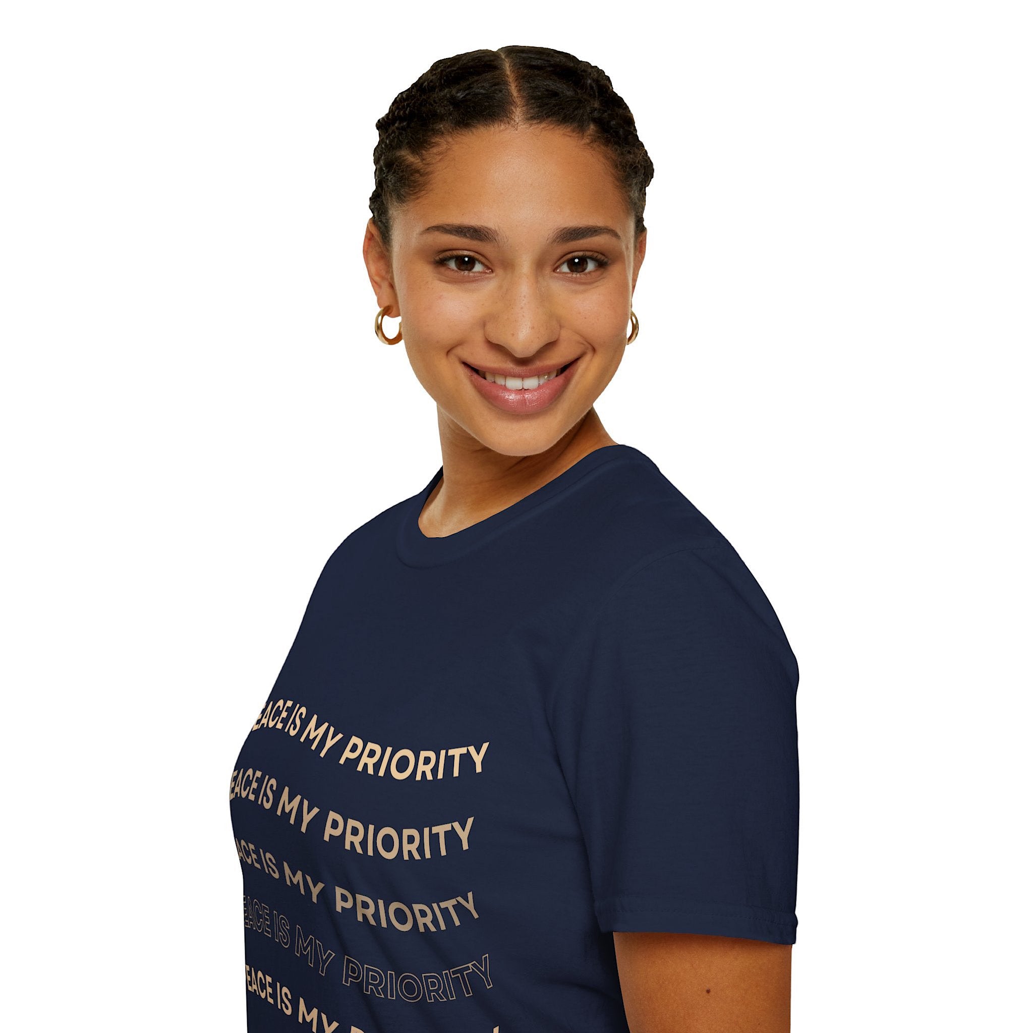 Person wearing a navy blue t-shirt with 'Peace is my priority' text on a white background