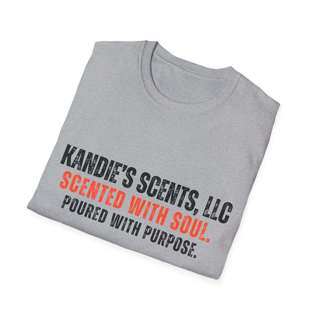 Folded gray t-shirt with 'Kandie's Scents, LLC- Scented with Soul. Poured with Purpose.' text on a white background