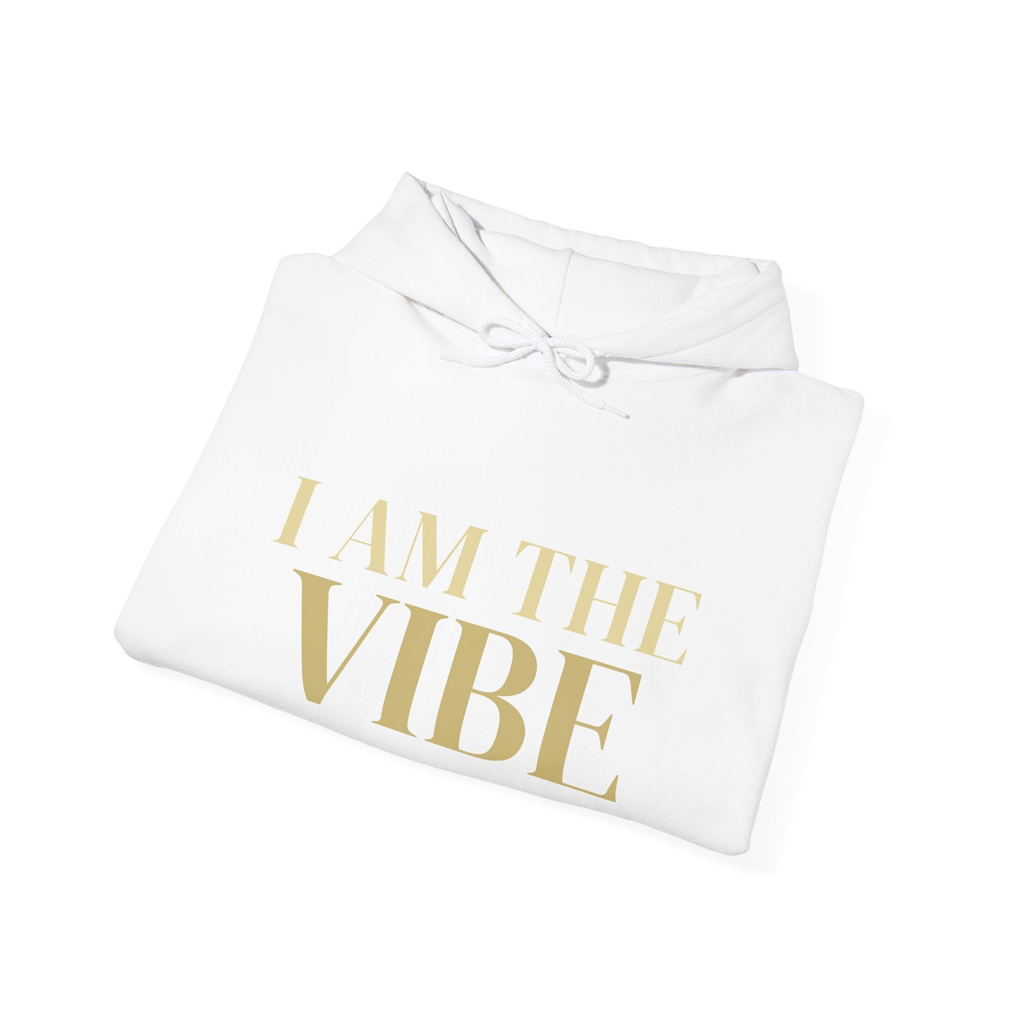 White hoodie with 'I AM THE VIBE' text in gold on a white background