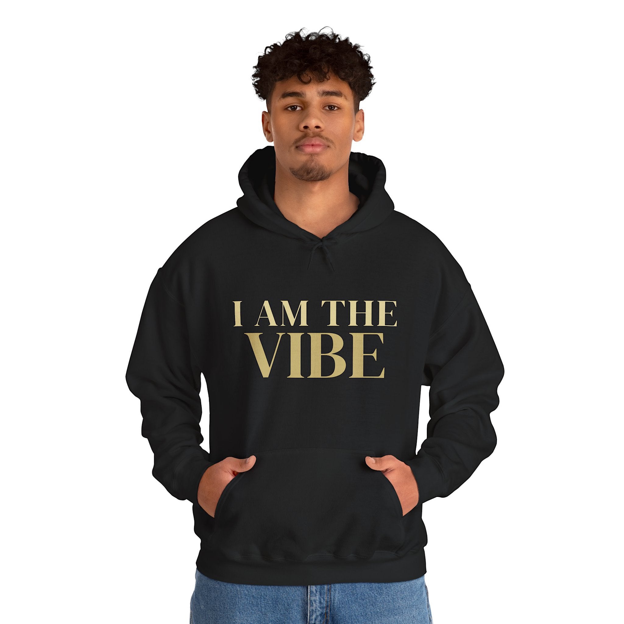 Person wearing a black hoodie with 'I AM THE VIBE' text on a white background