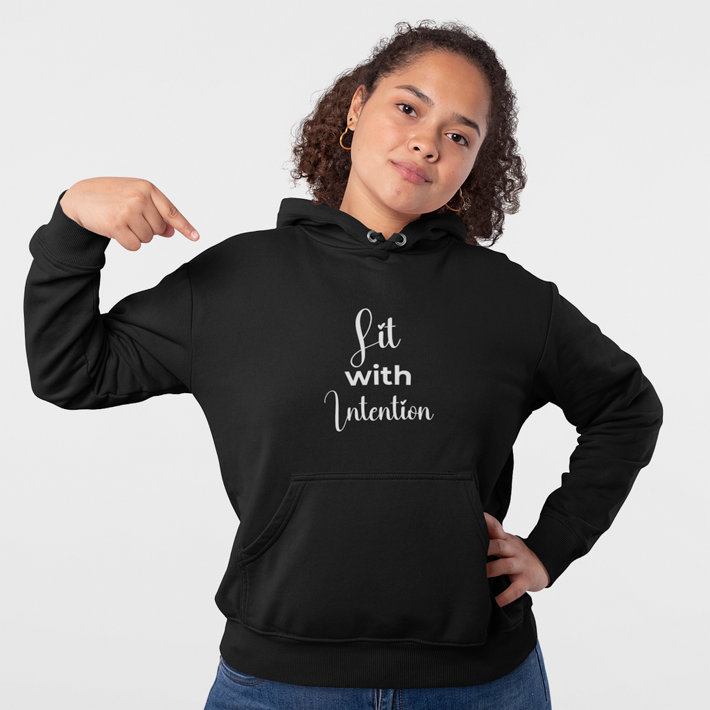 Person wearing a black hoodie with 'Lit with Intention' text on a plain background
