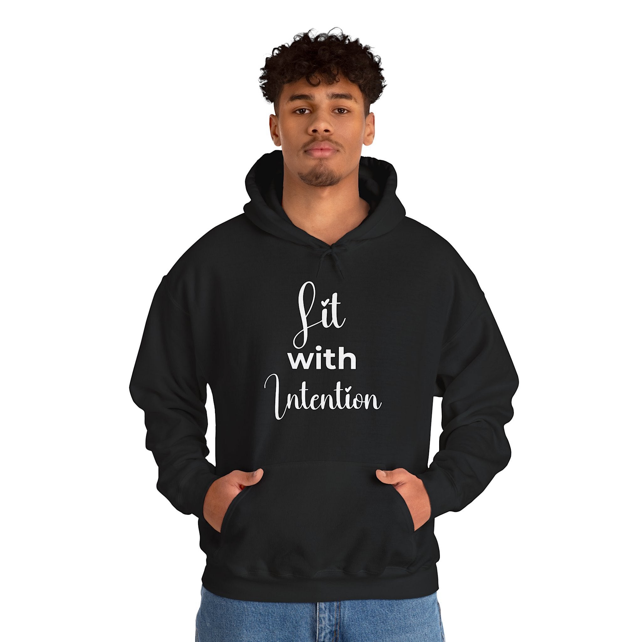 Person wearing a black hoodie with 'Lit with intention' text on a white background