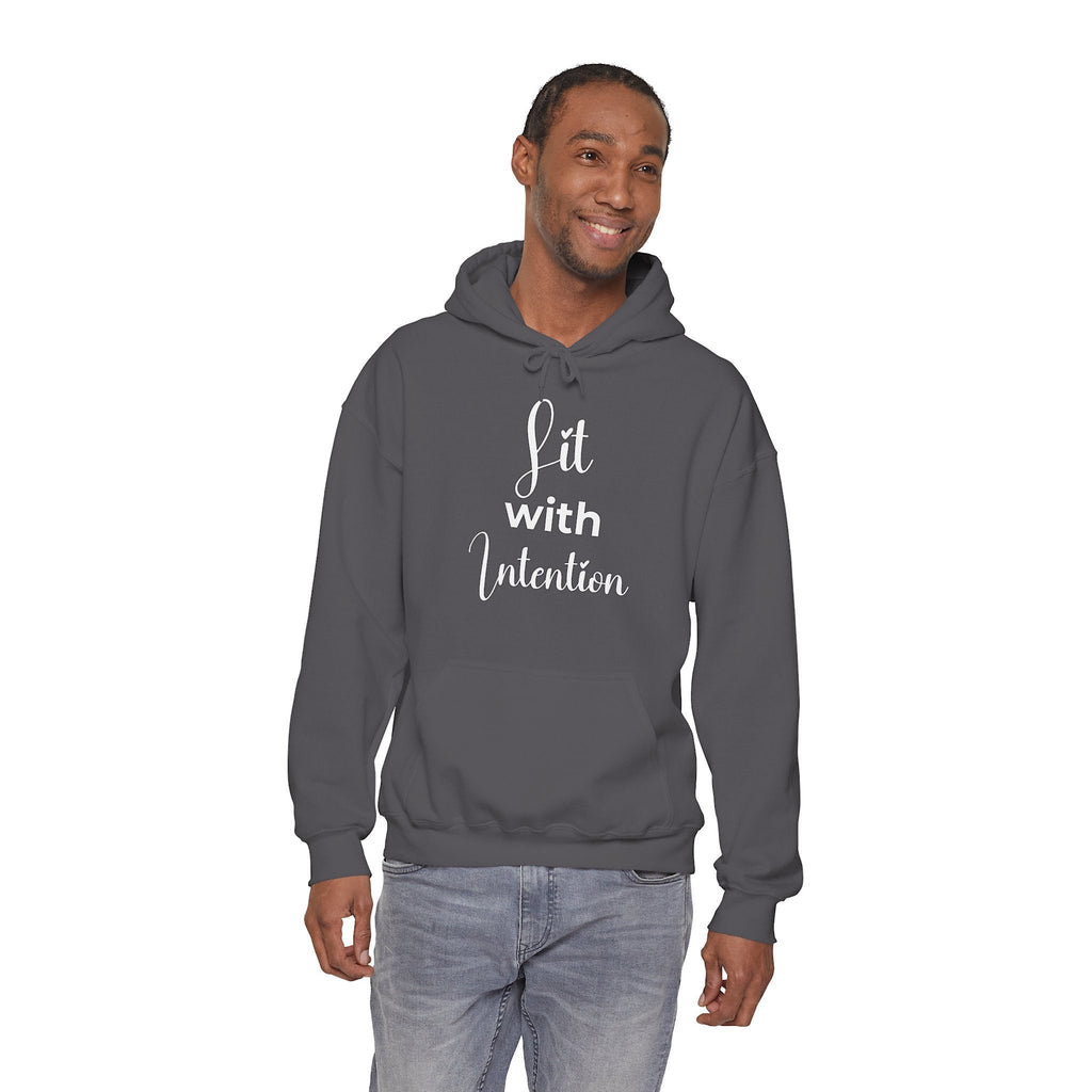 Man wearing a gray hoodie with 'Lit with Intention' text on a white background