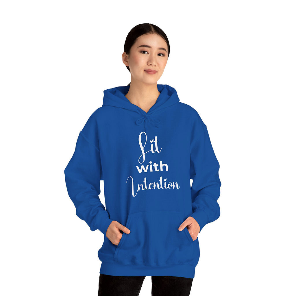 Person wearing a blue hoodie with 'Lit with Intention' text on a white background