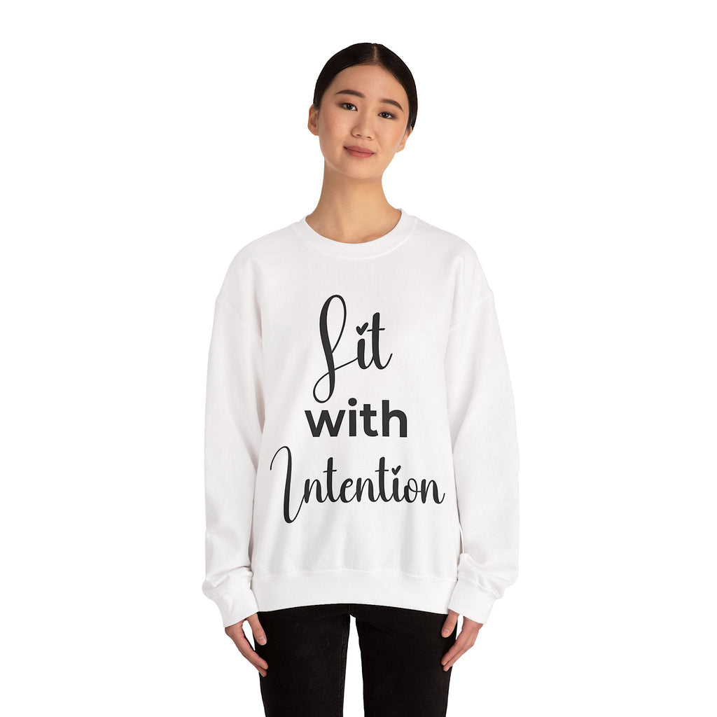 Person wearing a white sweatshirt with 'Lit with Intention' text design on a white background