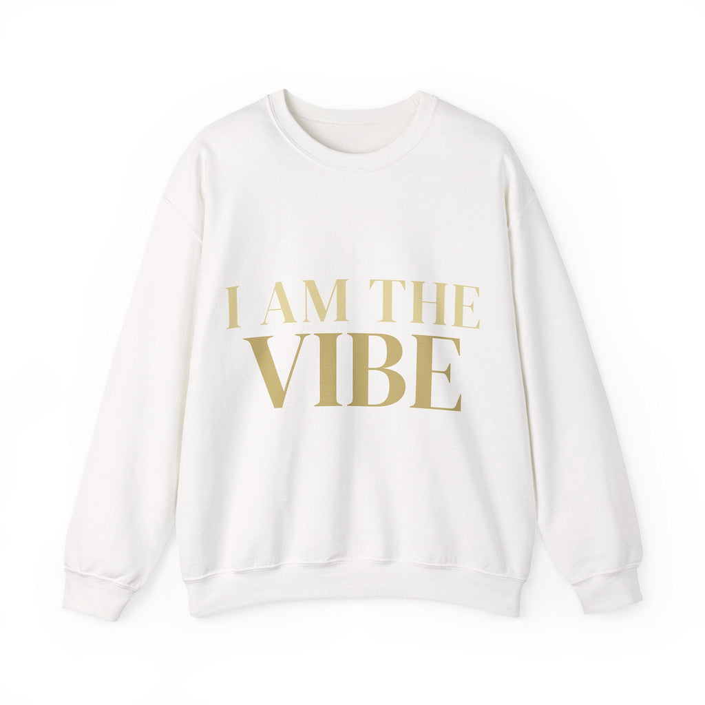 White sweatshirt with 'I AM THE VIBE' text in gold on a white background