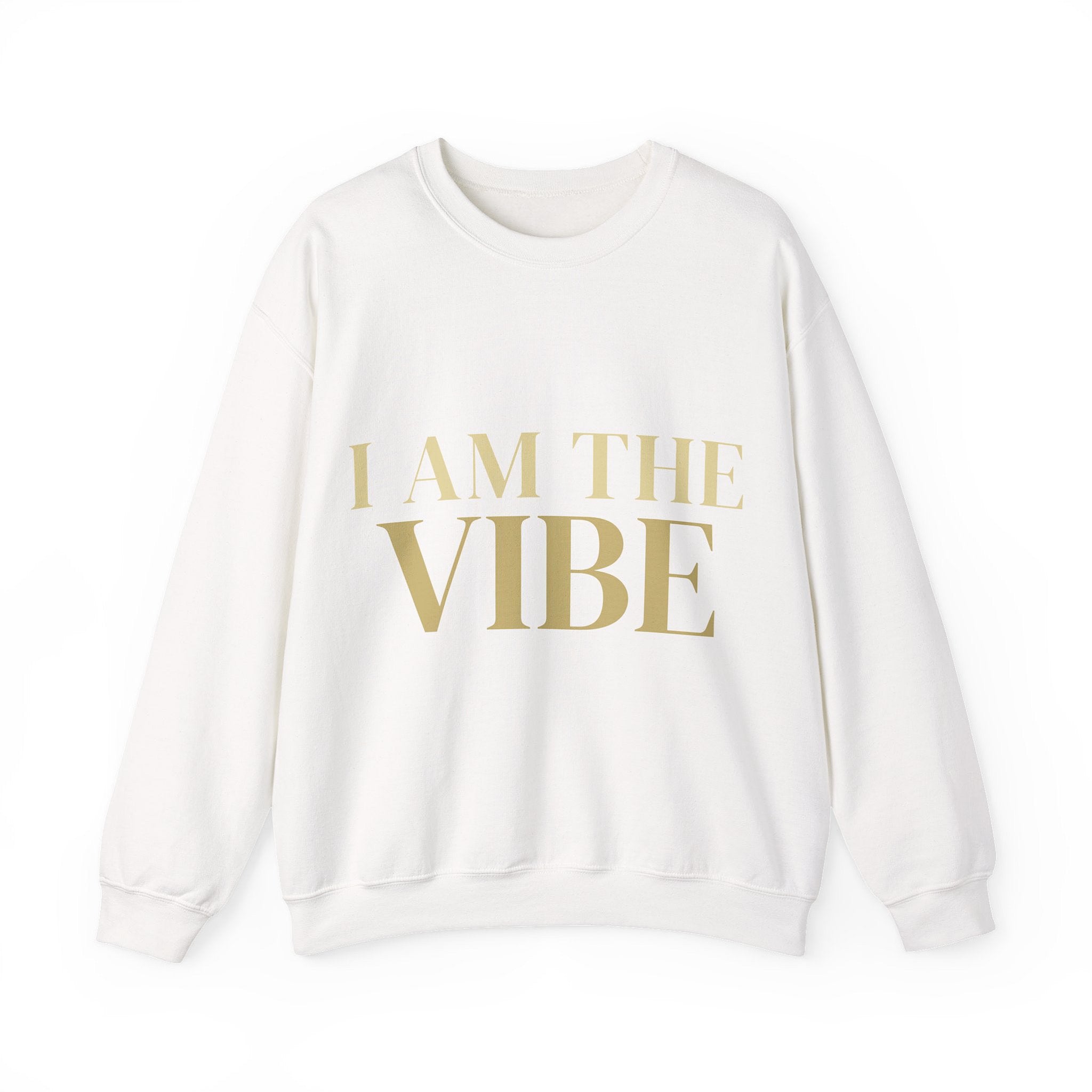 White sweatshirt with 'I AM THE VIBE' text in gold on a white background