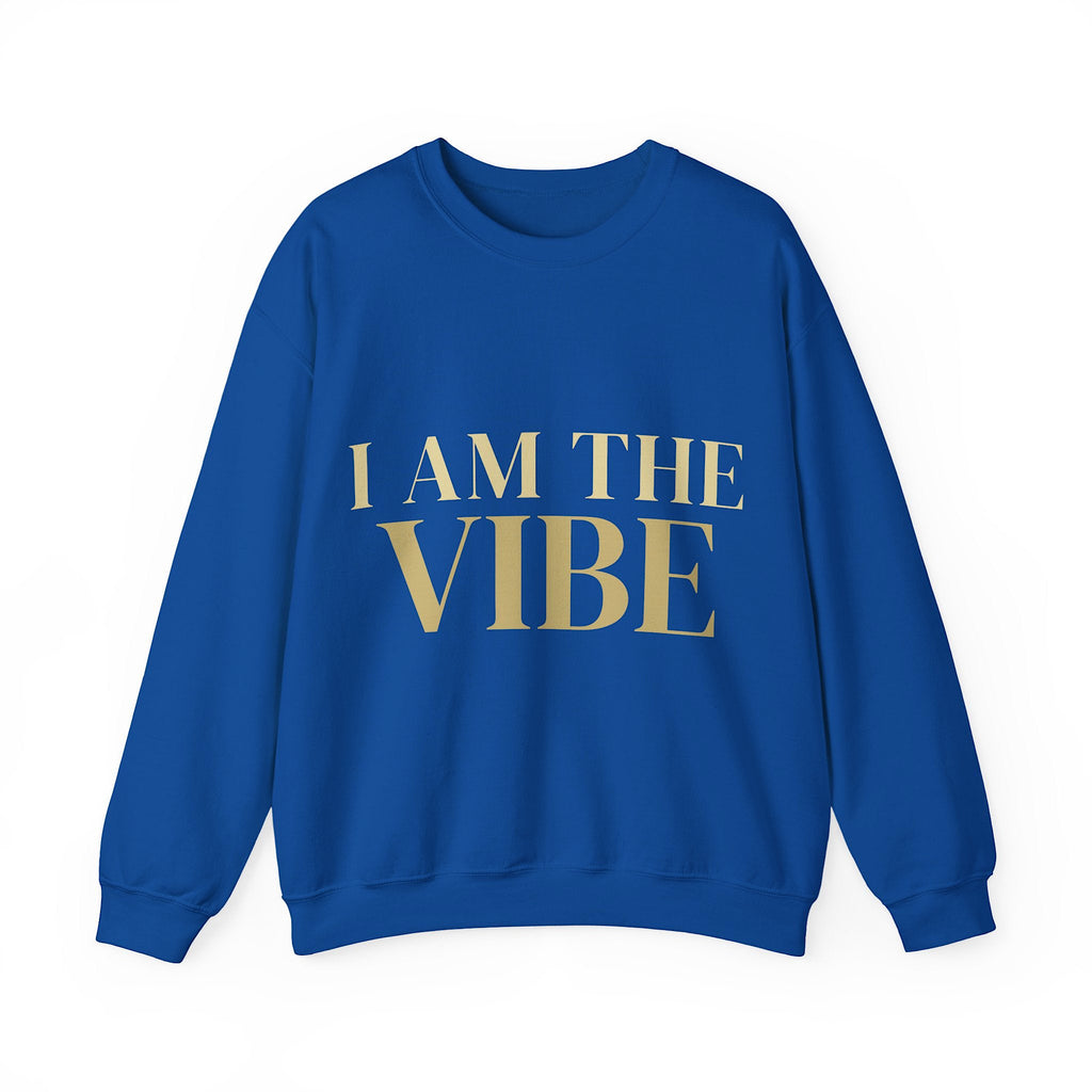 Blue sweatshirt with 'I AM THE VIBE' text in gold on a white background