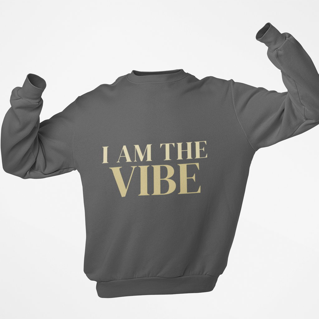 Gray sweatshirt with 'I AM THE VIBE' text on a white background