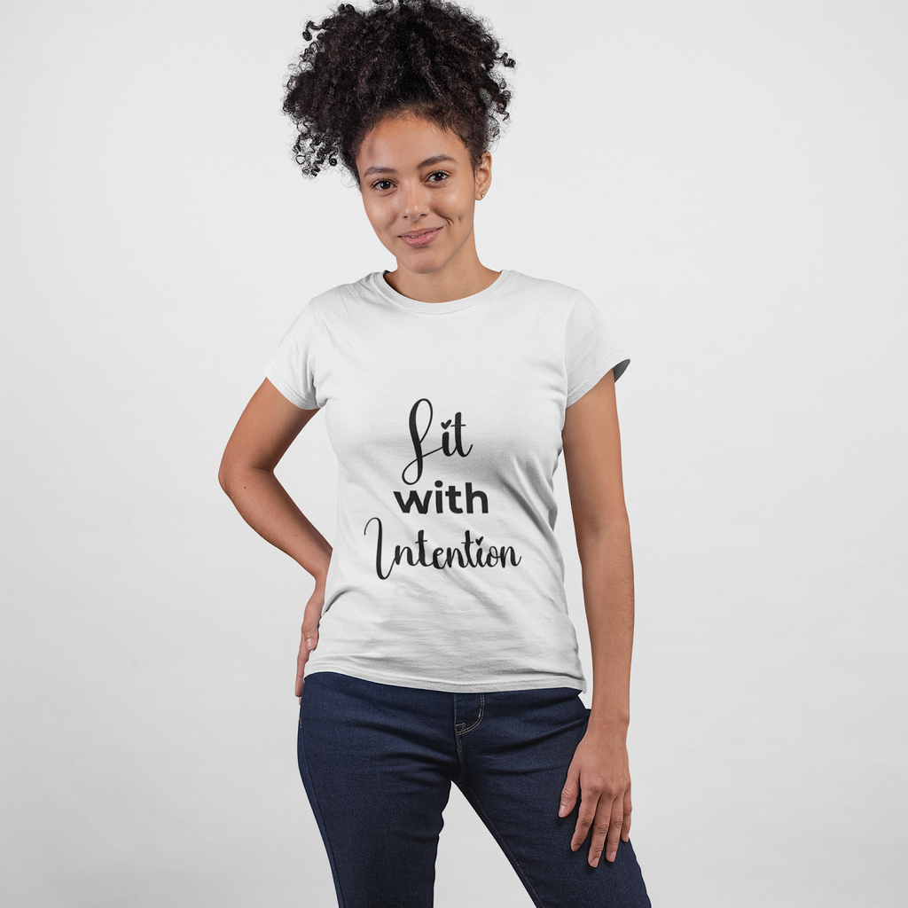 Woman wearing a white t-shirt with 'Lit with Intention' text on a plain background