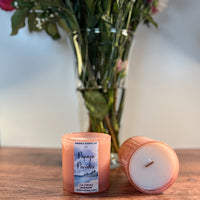 Pink glass jar candle with wooden wick and tropical fragrance