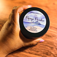 Matte black travel tin candle with fruity tropical fragrance