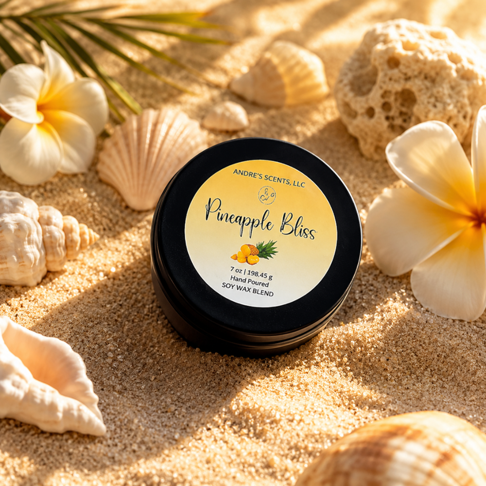 Pineapple Bliss candle in sand with shells and flowers