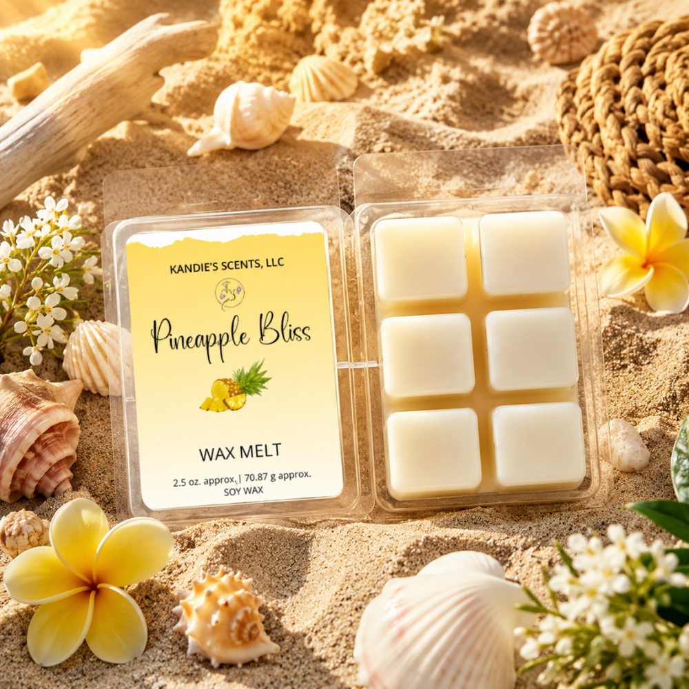 Wax melt packaging with 'Pineapple Bliss' label on a sandy background with flowers and shells.