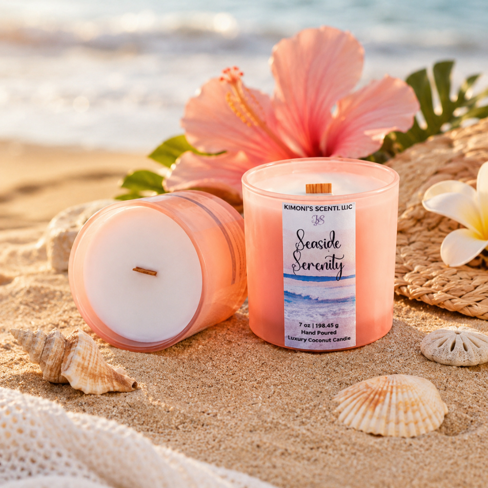 Candle labeled 'Seaside Serenity' on a sandy beach with flowers and shells.