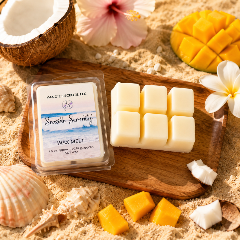 Kandie's Scents wax melts on a wooden board with tropical fruits and flowers on sand
