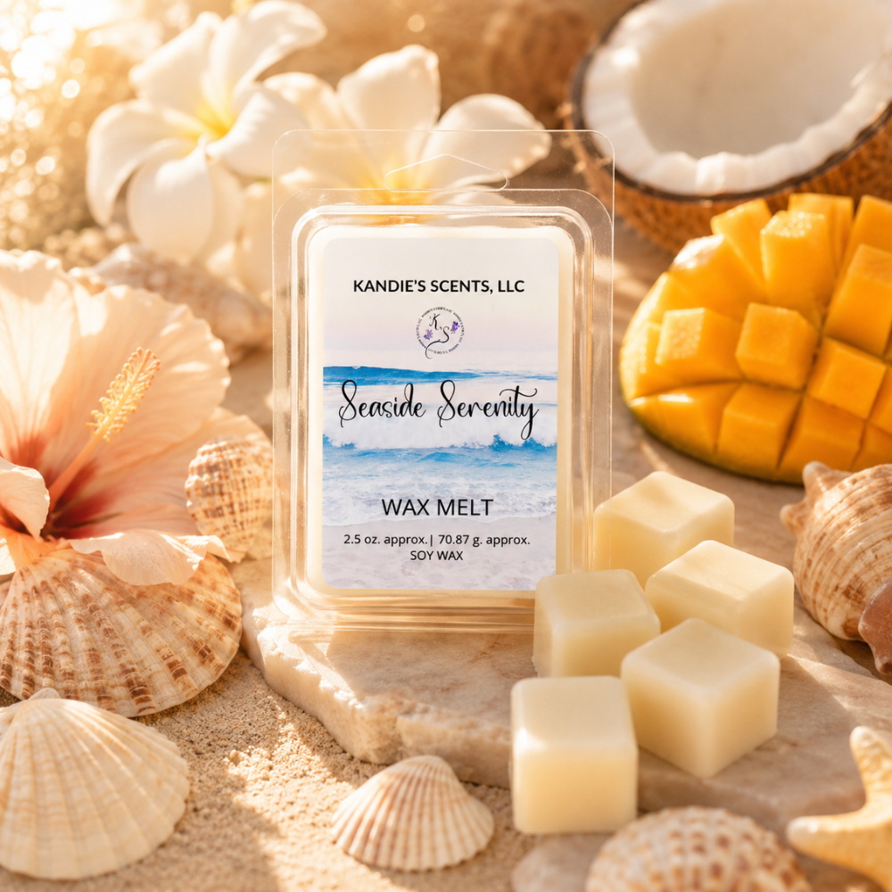 Kandie's Scents Seaside Serenity wax melt packaging with mango and shells on a sandy background
