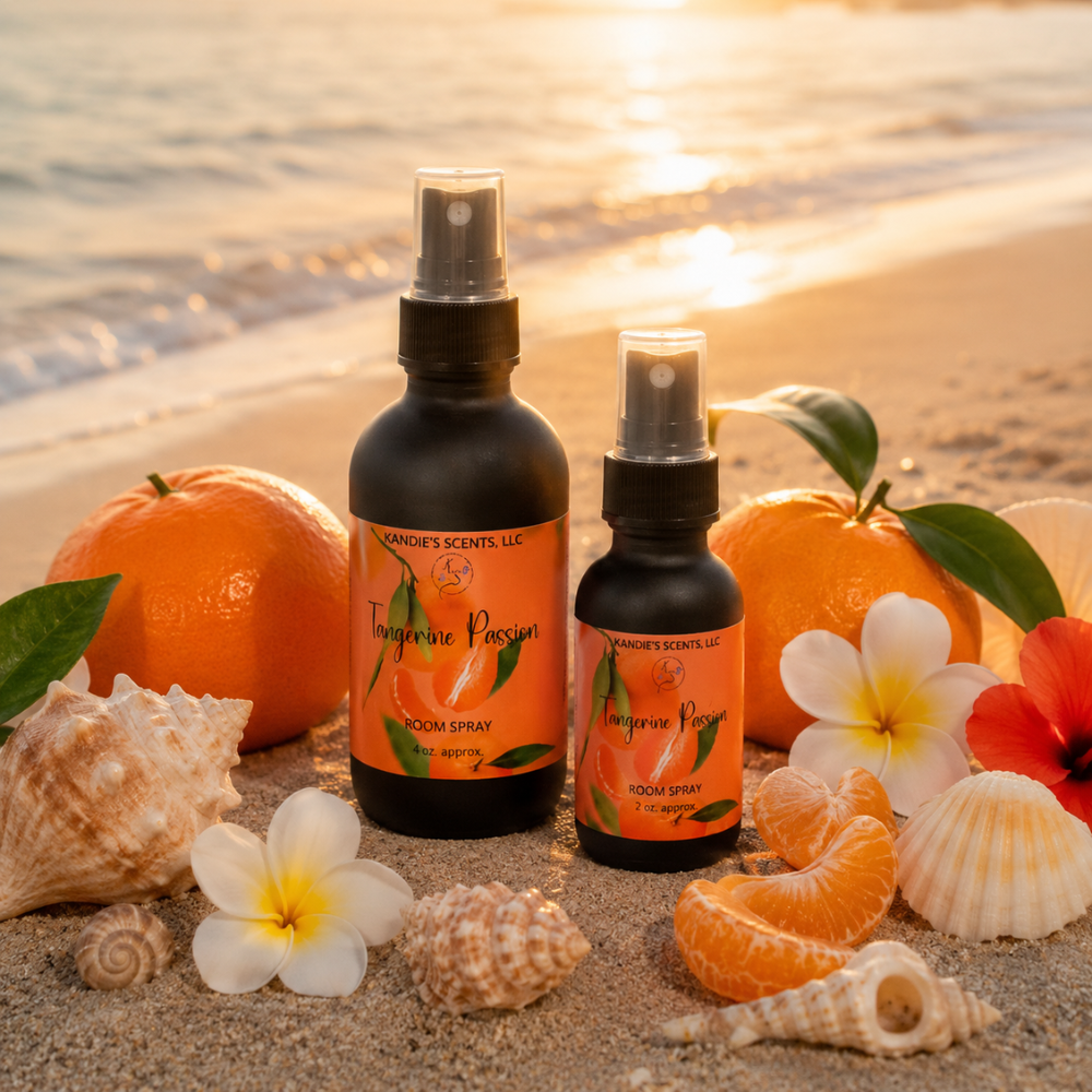 Two bottles of 'Tangerine Passion' perfume on a beach with oranges, flowers, and shells.