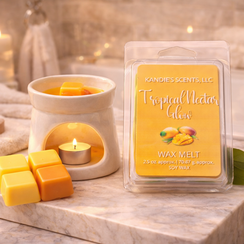 Kandie's Scents wax melt packaging with a wax melt burner and melts on a marble surface.