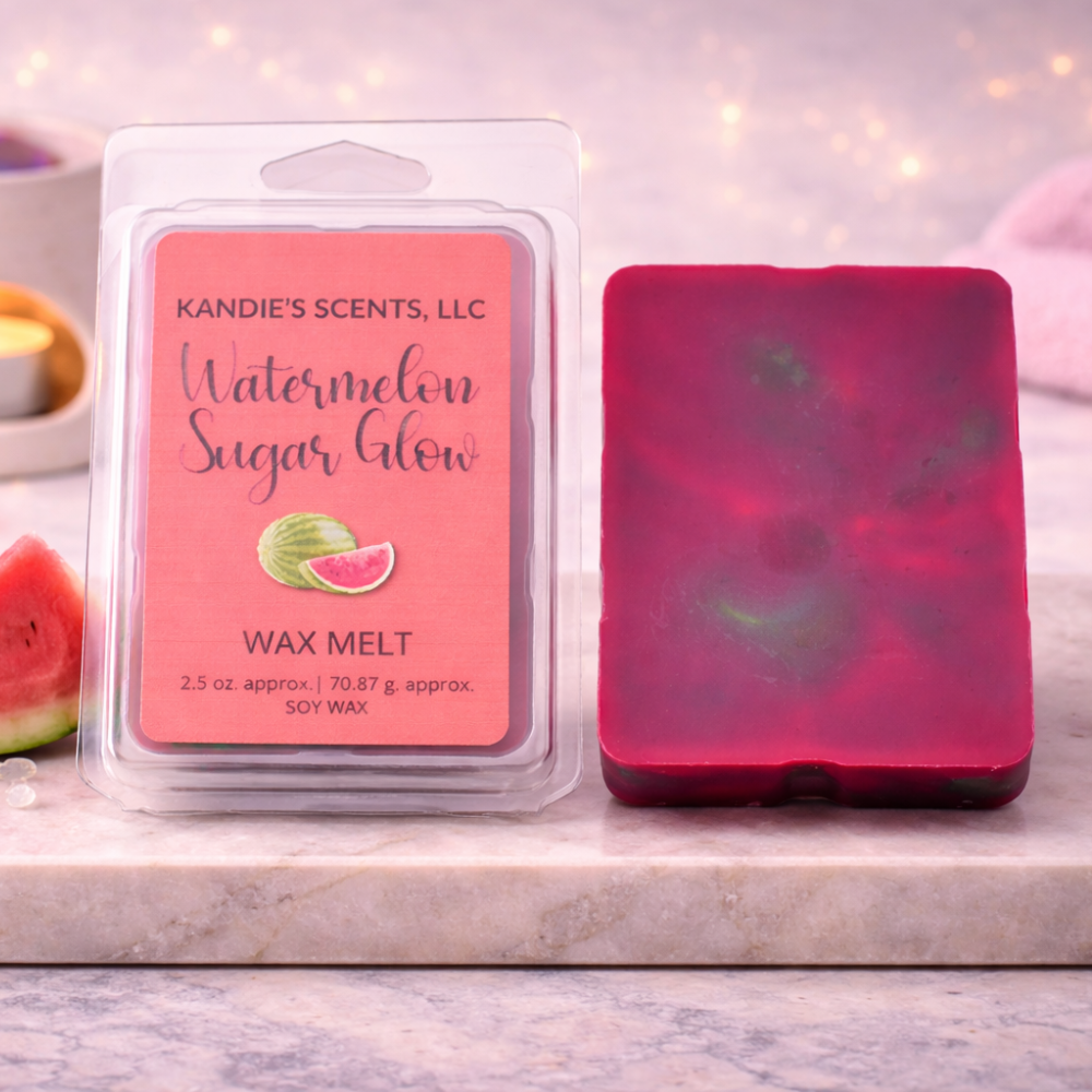 Kandie's Scents watermelon sugar glow wax melt with packaging on a marble surface.