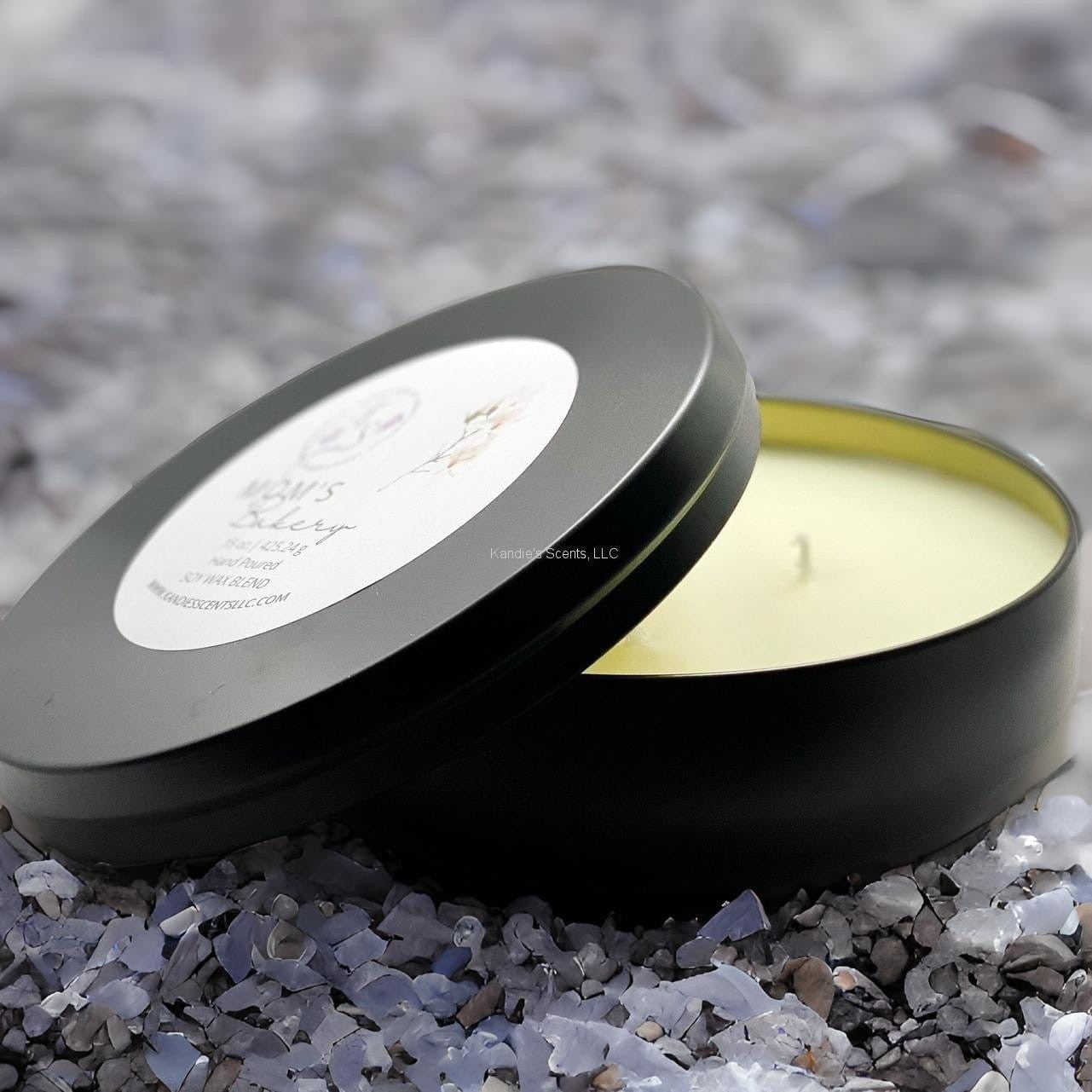 Matte black tin candle with sugar, butter, and dough notes