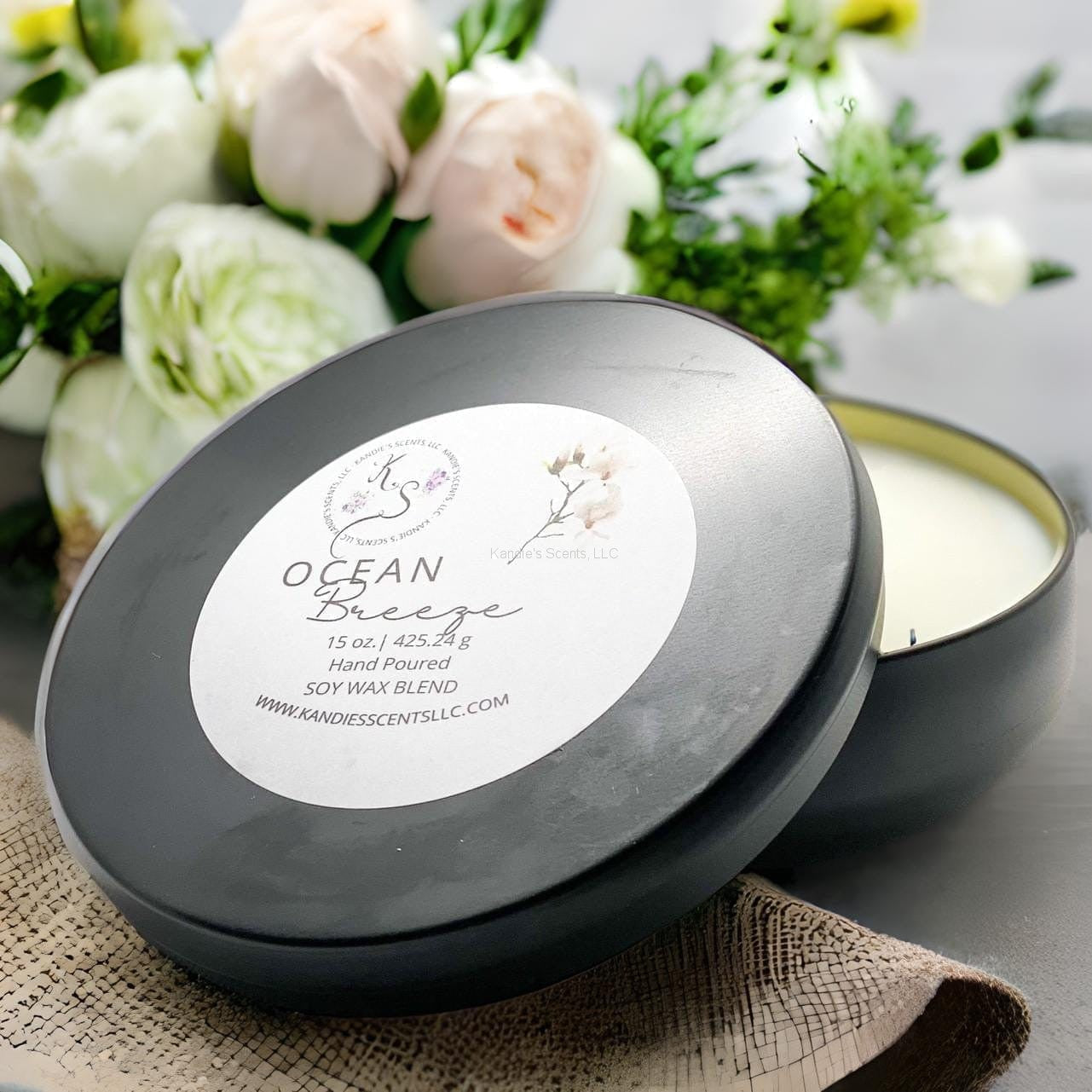 Matte black soy blend tin candle with fresh ocean fragrance