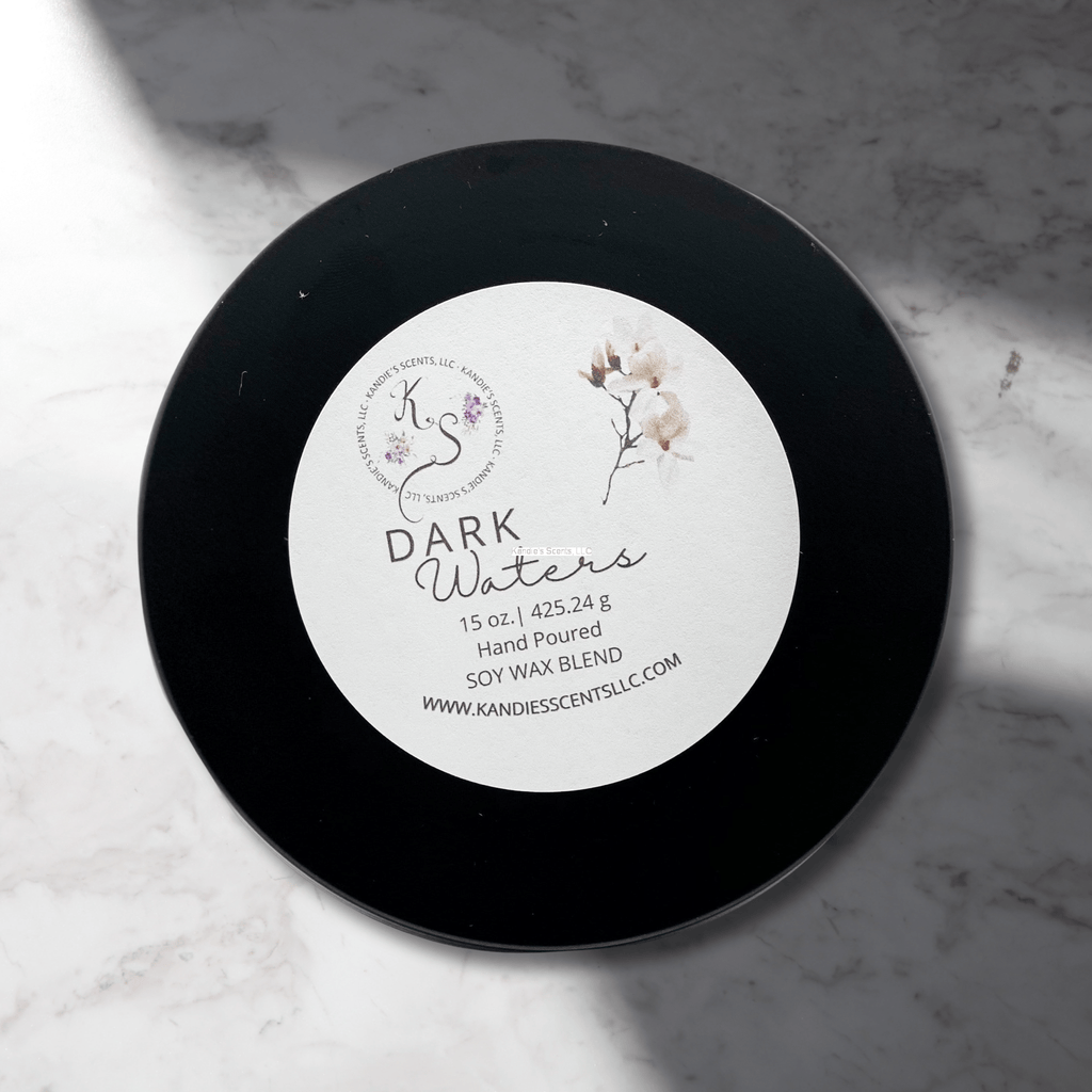 Soy wax blend candle in tin with dark musk and ozone