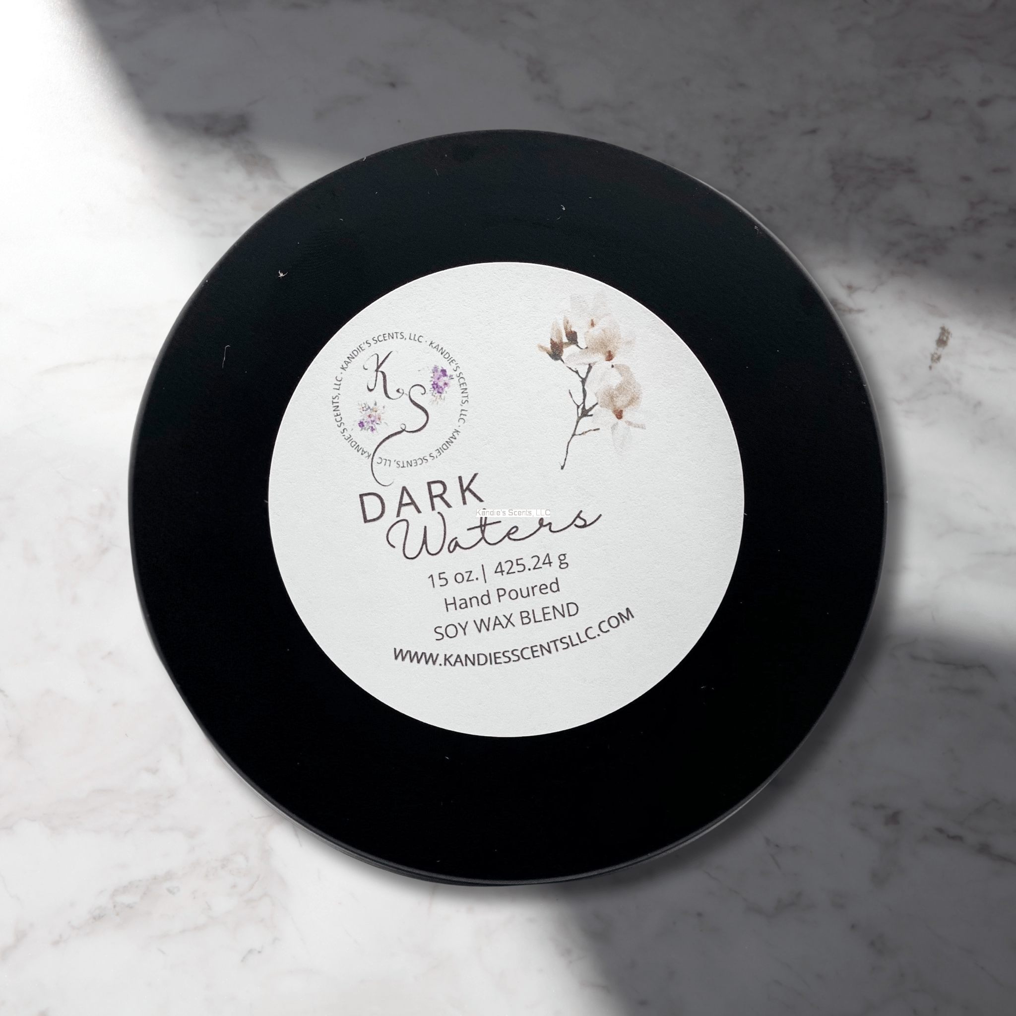 Soy wax blend candle in tin with dark musk and ozone