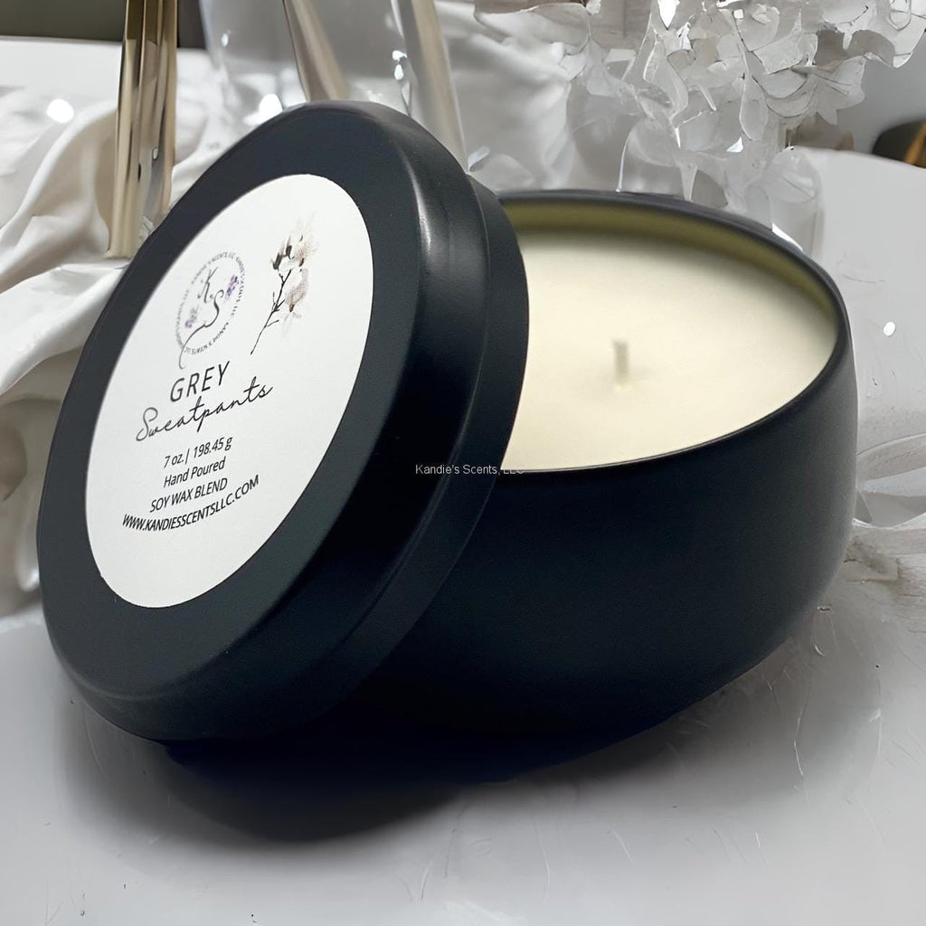 Matte black soy blend tin candle with mahogany and lavender