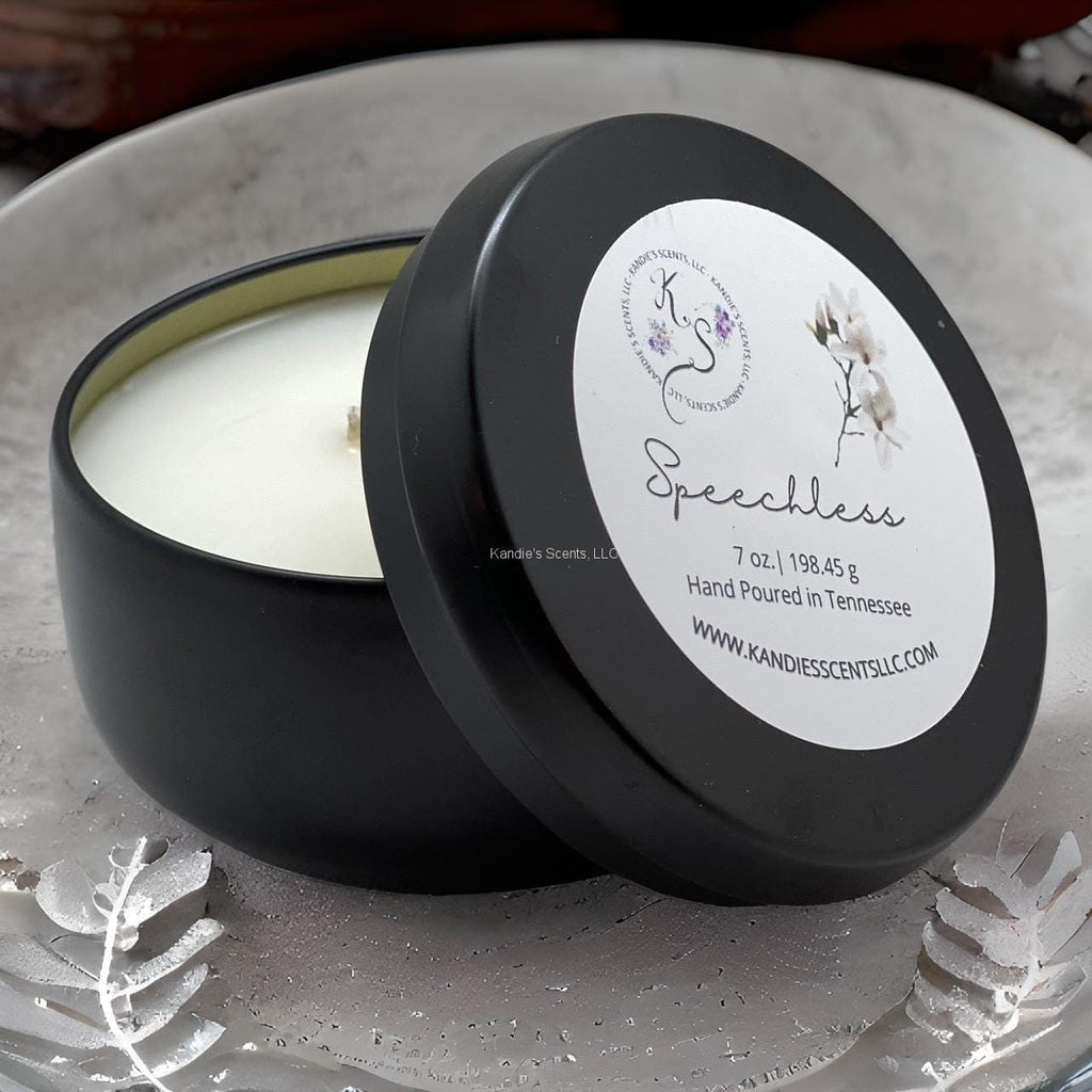 Speechless candle tin with vanilla, lavender, and smoky wood scent