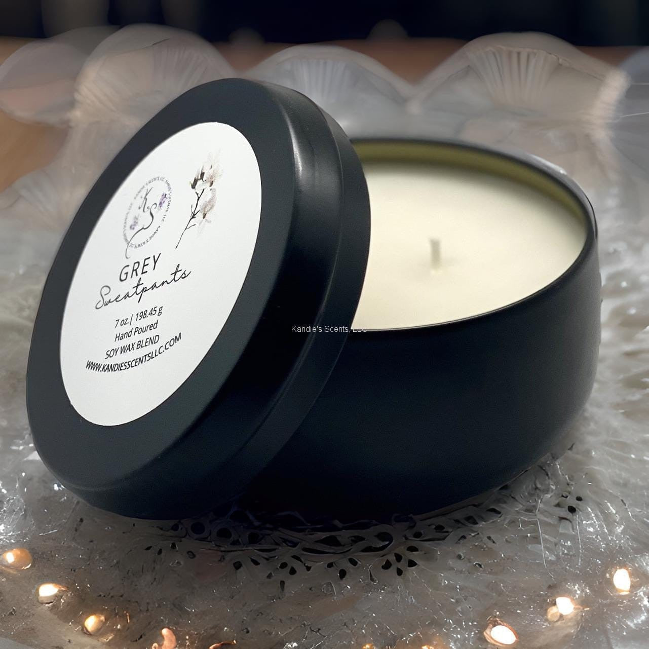 Matte black soy blend tin candle with mahogany and lavender